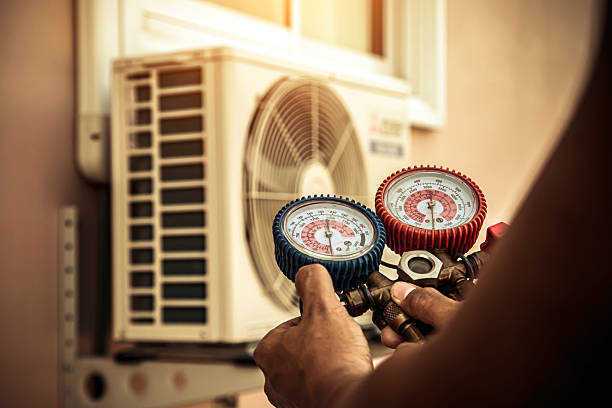 Professional Hvac technician working in Hemet, CA